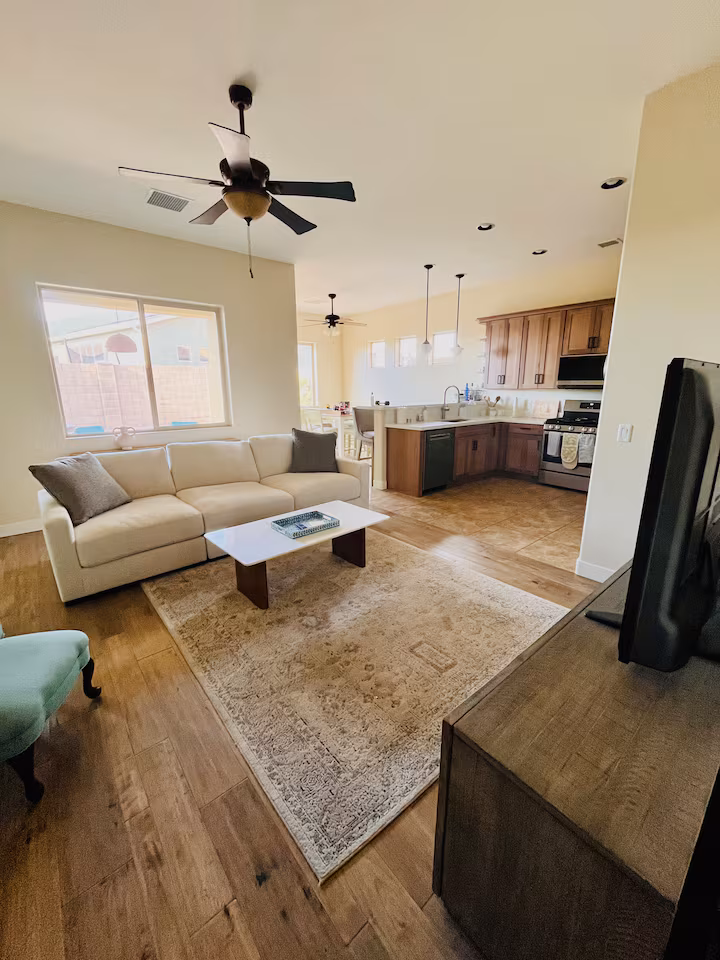 Modern kitchen with quartz countertops and 5-burner gas range